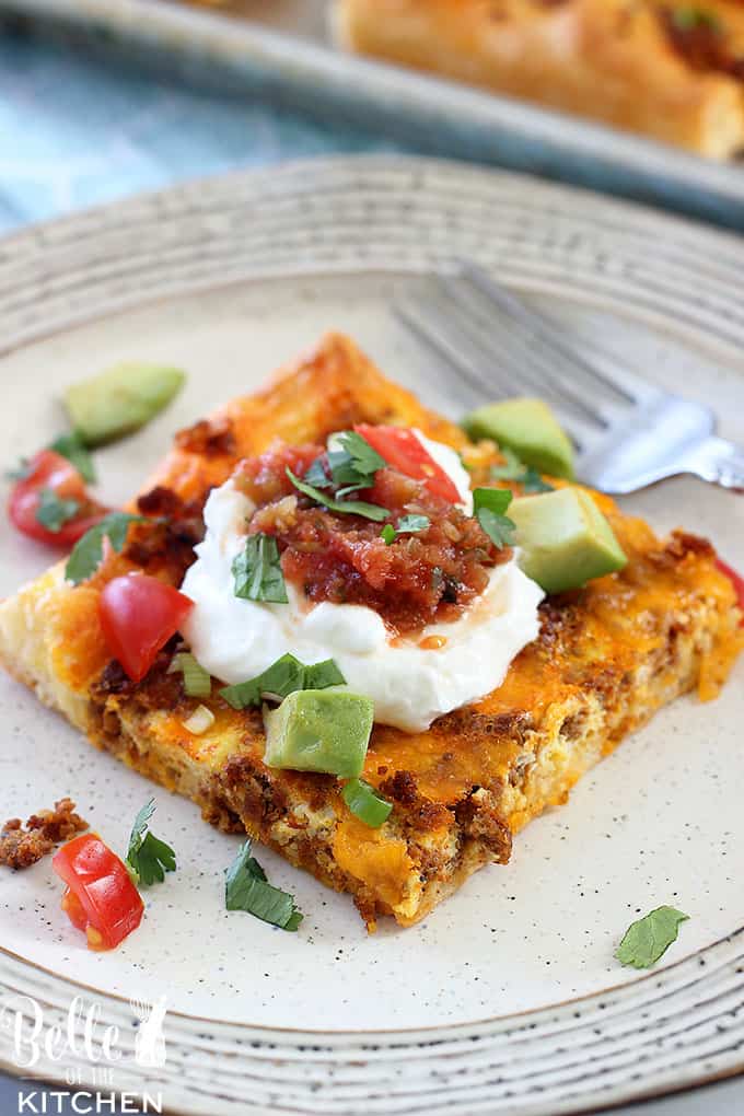 A close up of food on a plate, breakfast pizza with chorizo