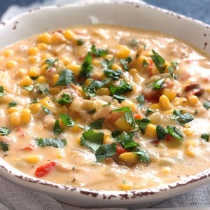 A bowl chipotle corn chowder with cilantro on top