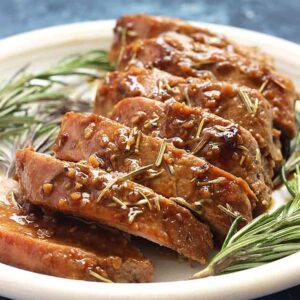 A plate of sliced pork tenderloin