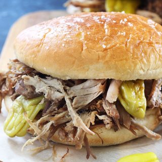 This Mississippi Pulled Pork is one of the easiest and most delicious recipes you can make with your crockpot! It's an amazing dump and go recipe that tastes so good served as a sandwich with mayo and a slice of melty cheese!