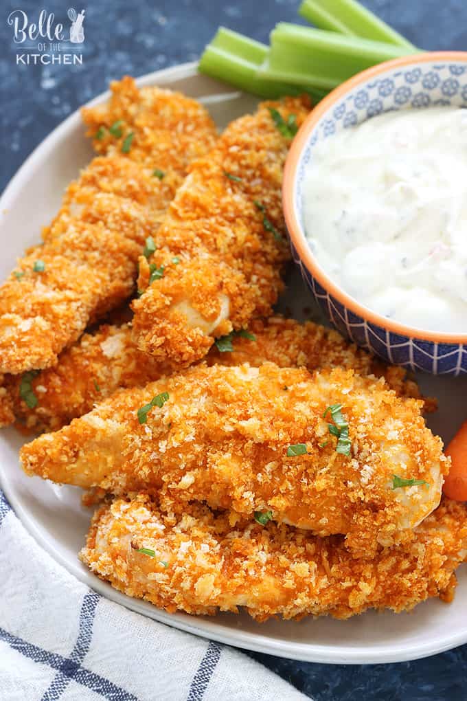 A plate of food, with Chicken fingers