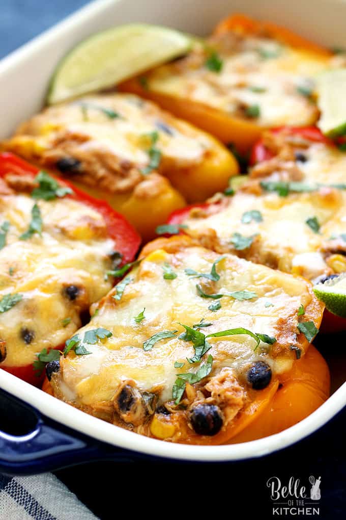 A close up of sliced peppers filled with chicken enchilada filling 