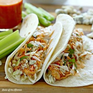Juicy and delicious buffalo chicken cooked to perfection with the help of your crockpot. Stuff it into tortillas with a little coleslaw mix, blue cheese crumbles, and a drizzle of homemade Buffalo Ranch, and you have an easy and yummy dinner!