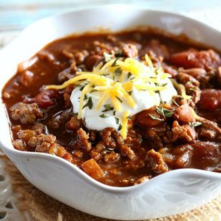 This Slow Cooker Chili is a family favorite. It's warm and hearty on a chilly night, and tastes great paired with a big, buttery hunk of cornbread.