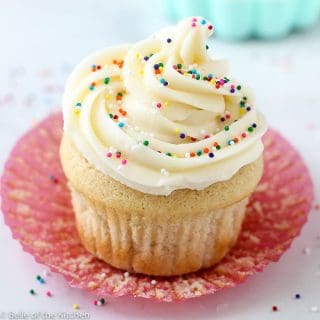 This is The Best Vanilla Buttercream Frosting! It's rich and creamy, and is super easy to whip up. It pipes beautifully, and is the perfect way to finish off all of your cakes and cupcakes!