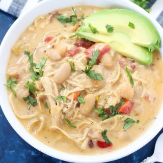 This Instant Pot Chipotle Chicken Chili is so delicious and easy to make. It's packed with bacon, beans, chicken, and plenty of smoky chipotle flavor that tastes warm and comforting on a cold day!