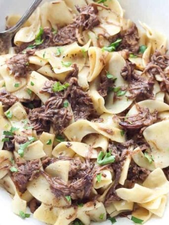A plate of food, with Beef and Noodles