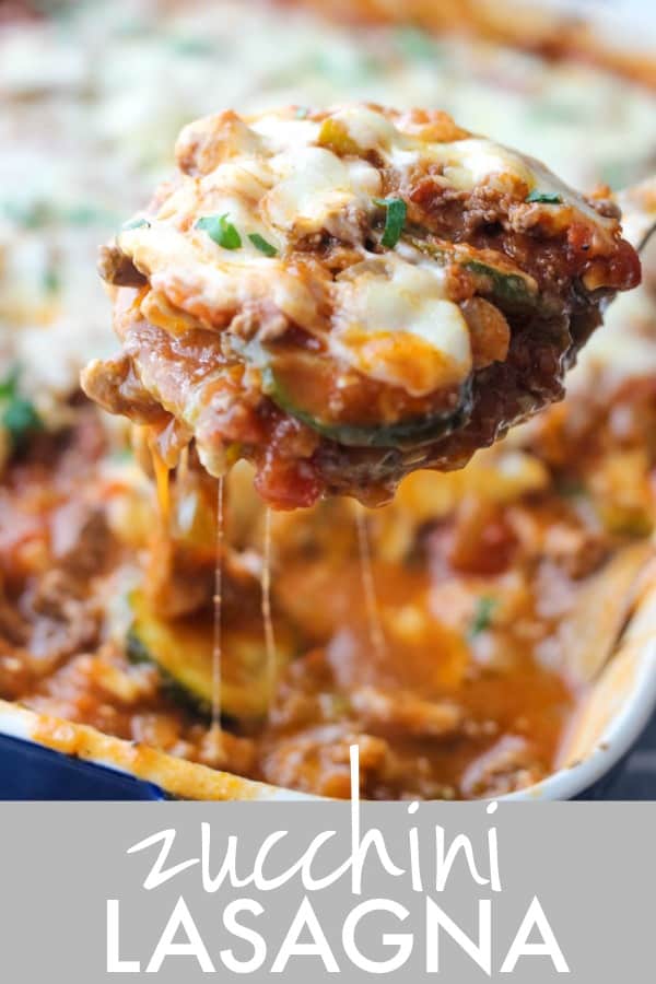 spoon filled with dripping cheese, marinara, and zucchini