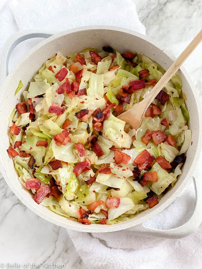 A bowl with Cabbage and bacon