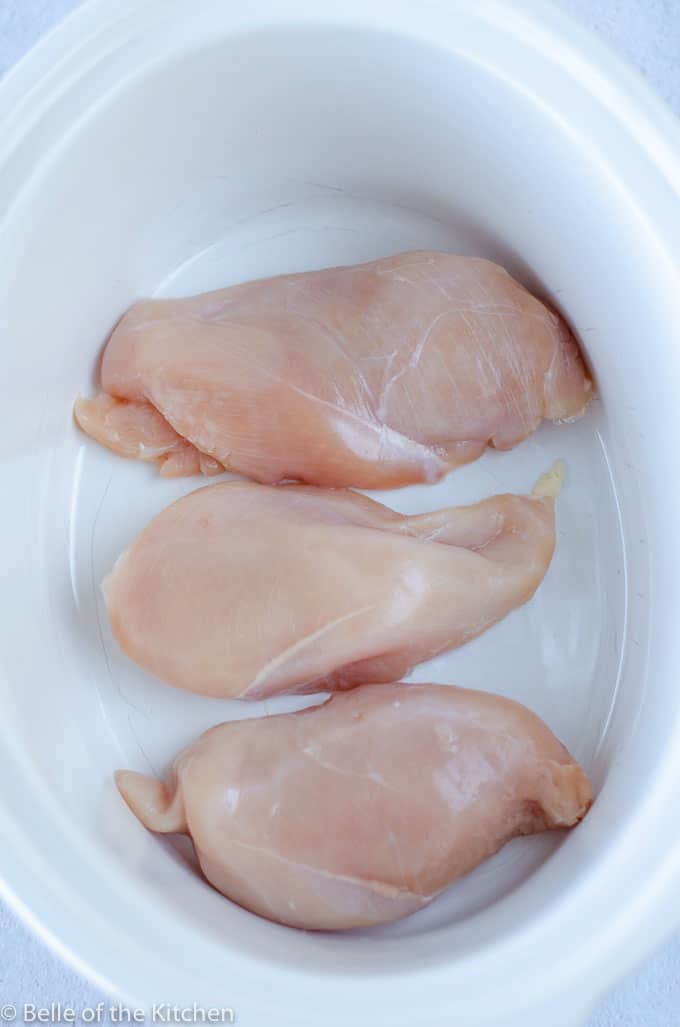 chicken breasts in a crockpot.