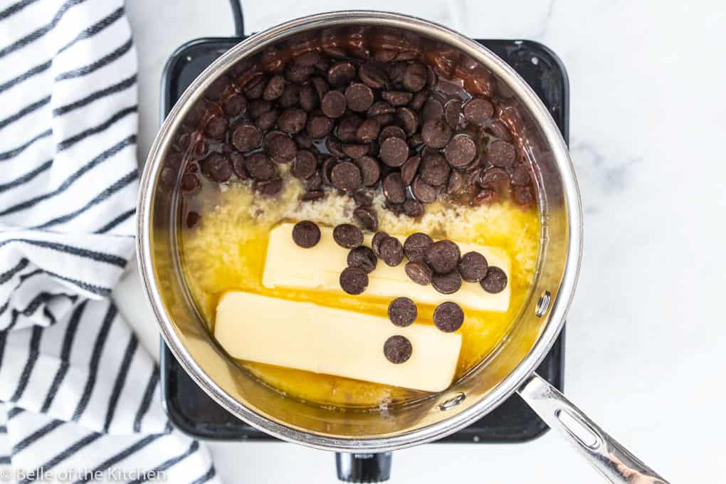 butter and chocolate chips cooking in a pan