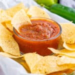 salsa in a bowl surrounded by tortilla chips