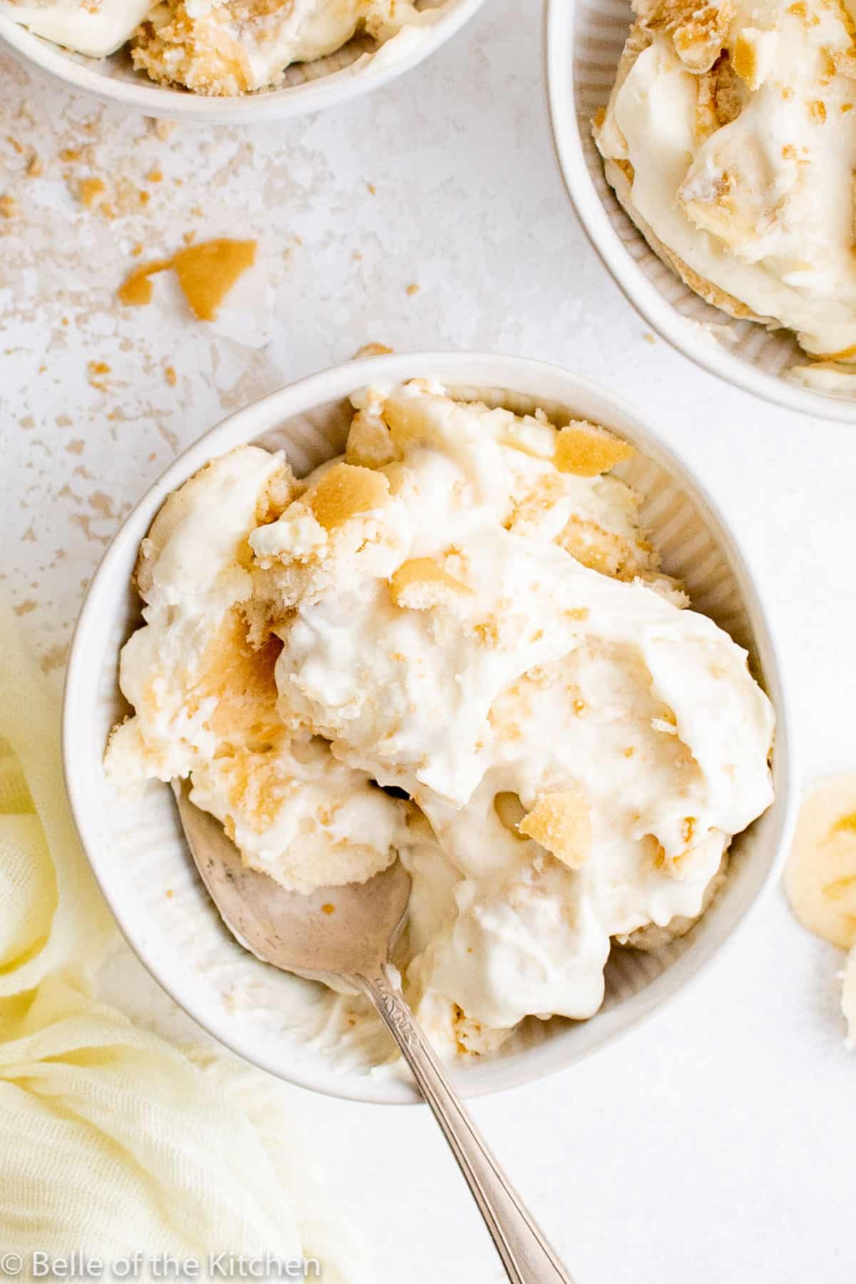 a bowl full of banana pudding with a spoon