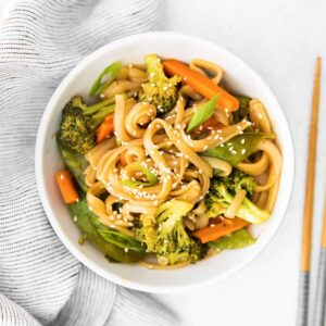 a bowl of veggies and rice noodles