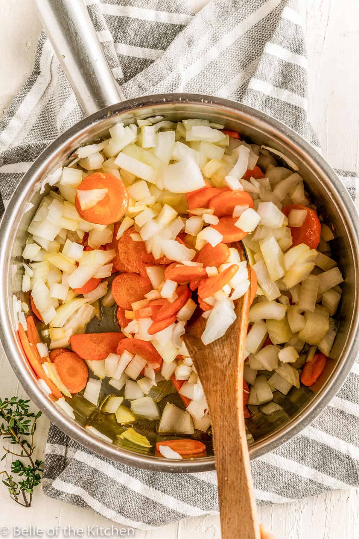 onions and carrots in a pot