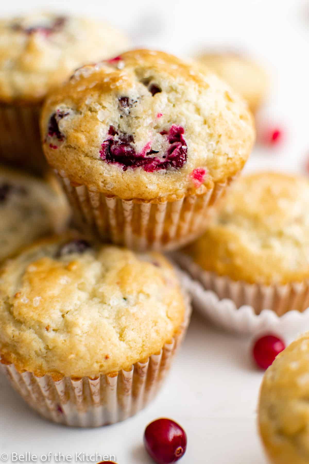 a stack of cranberry muffins