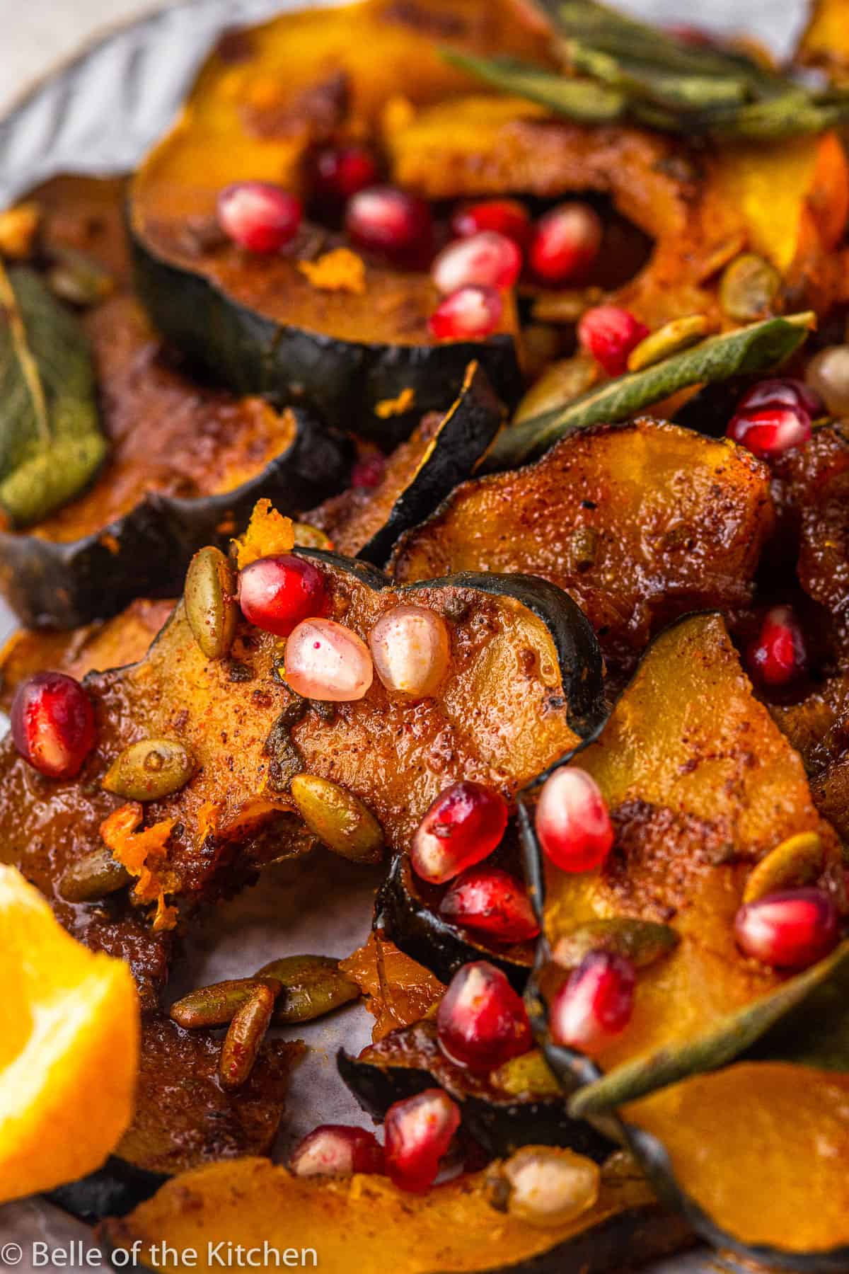 roasted acorn squash with sage and pomegranate seeds