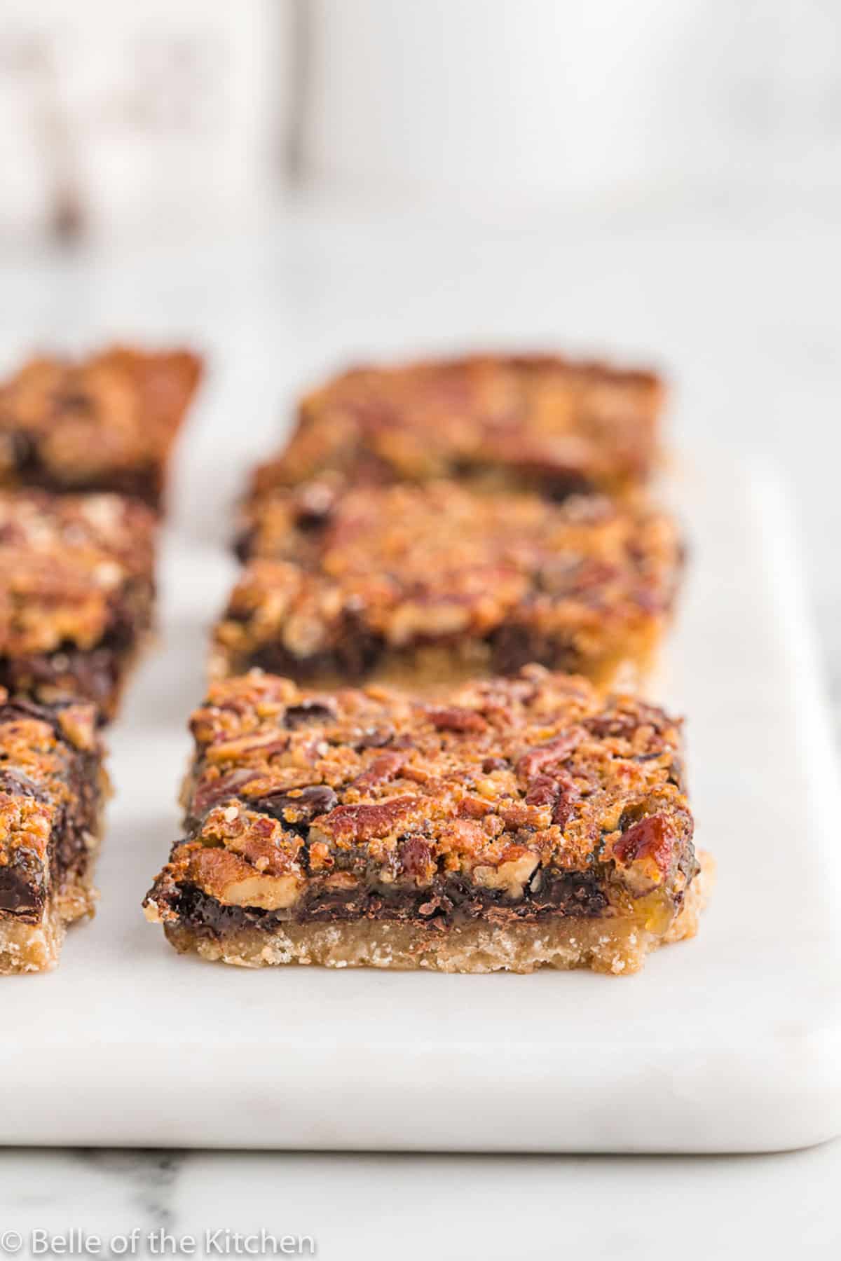 bars filled with pecans and chocolate cut in squares