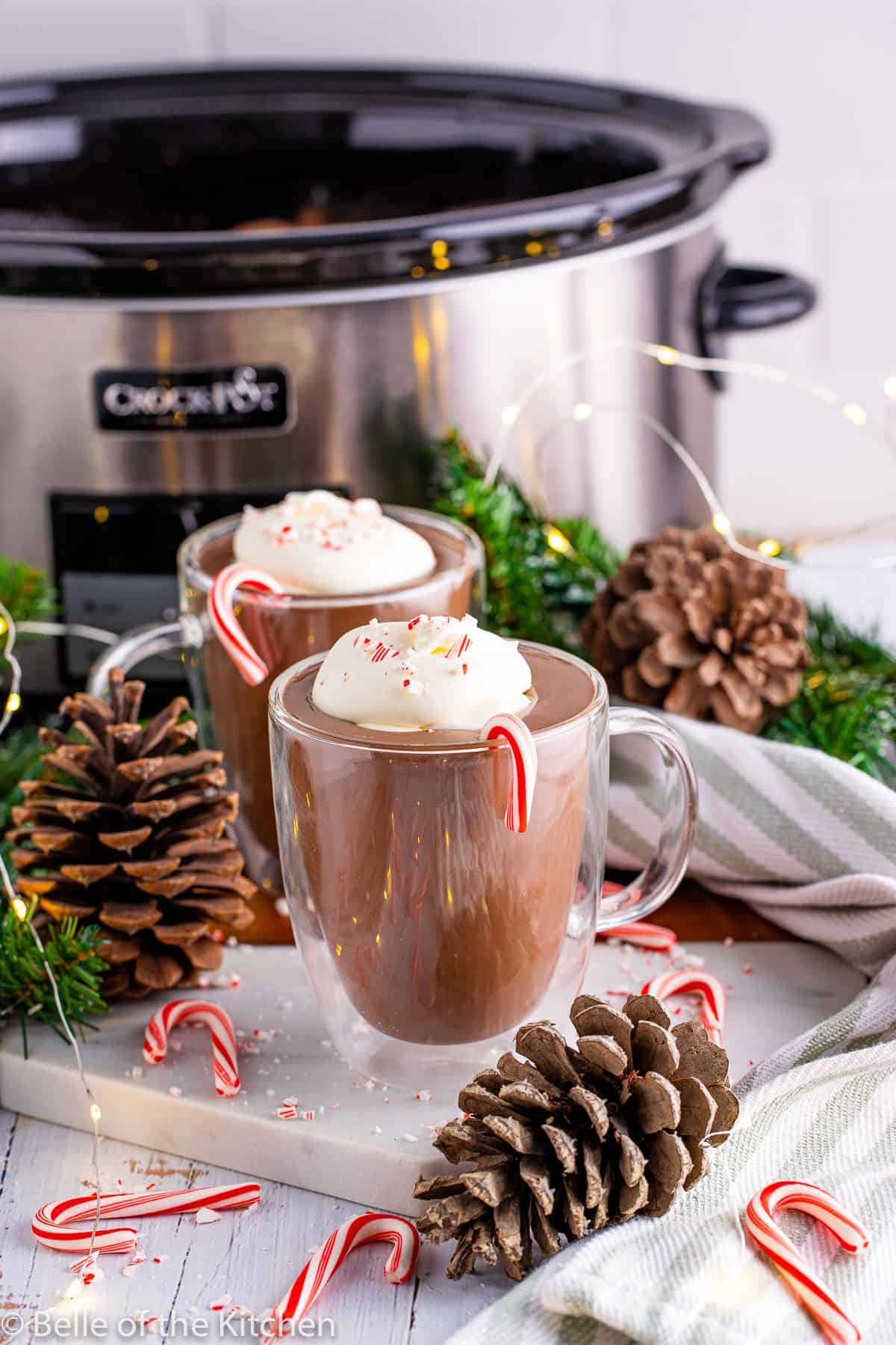 polar express hot chocolate next to a crockpot