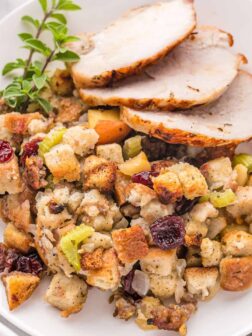 stuffing with turkey on a white plate