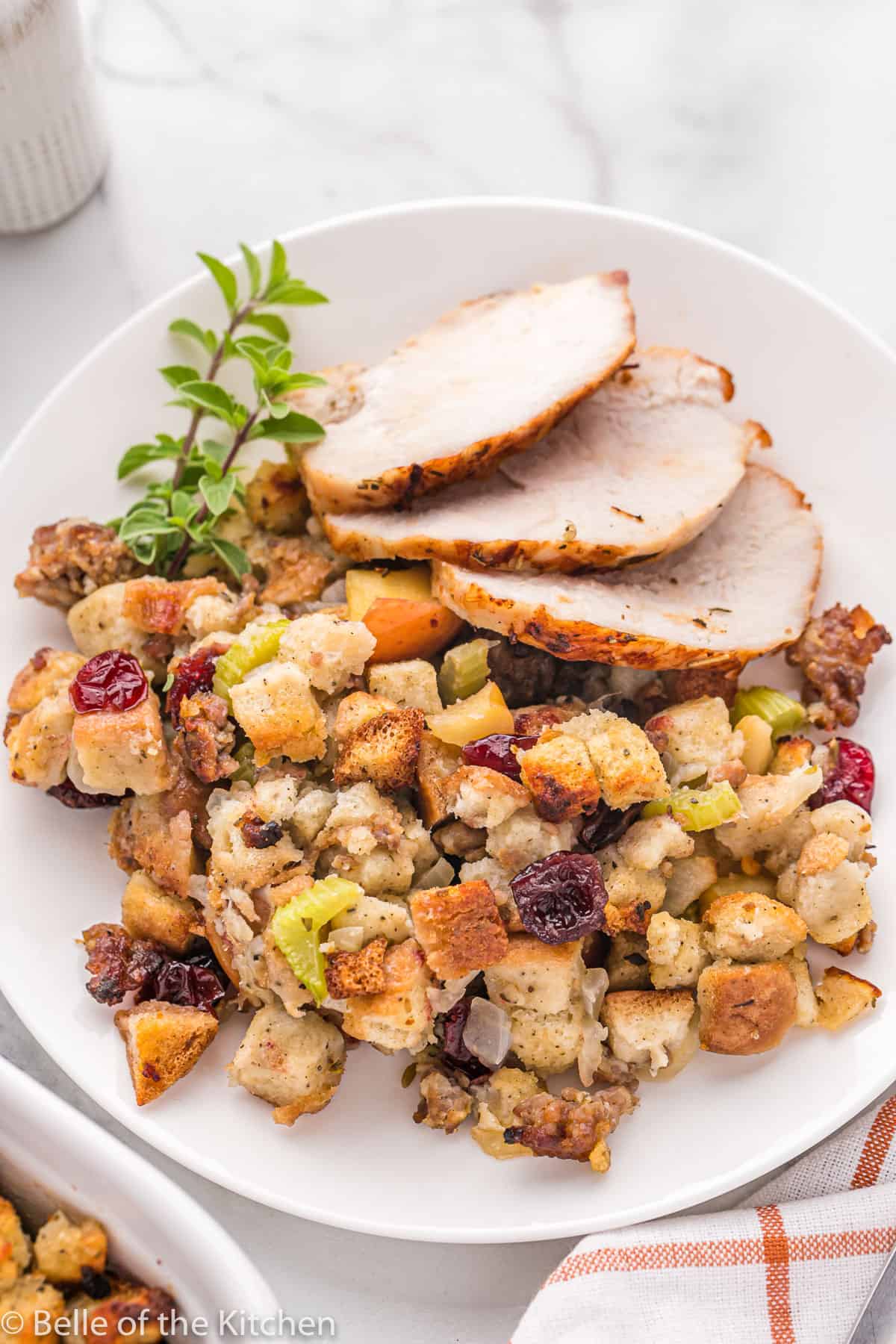 stuffing with turkey on a white plate