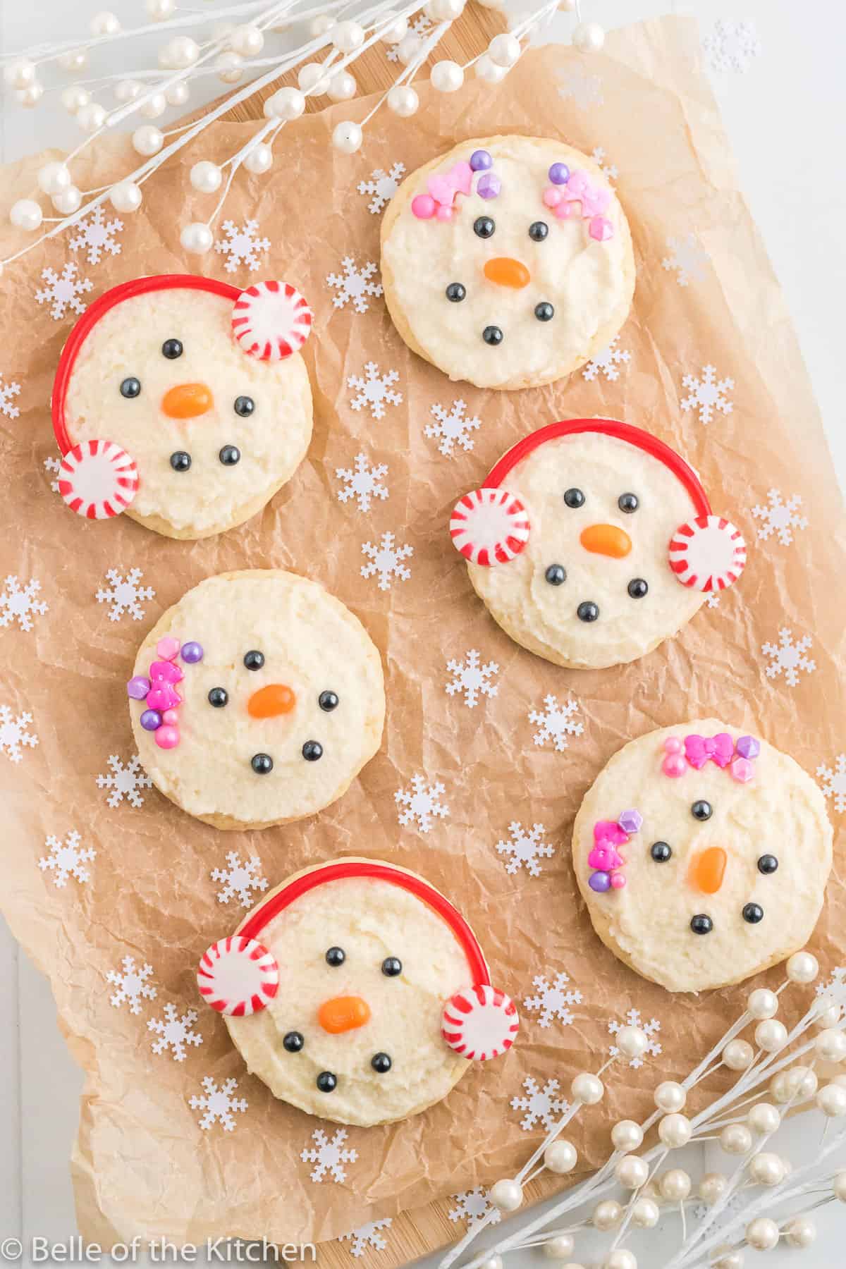 sugar cookies topped with decorations and mints