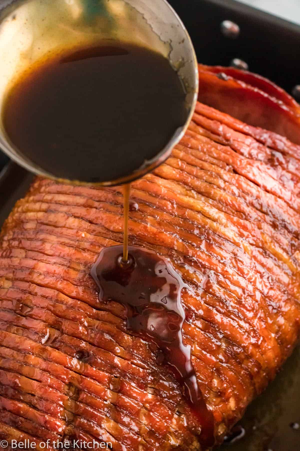 maple glaze poured over sliced ham