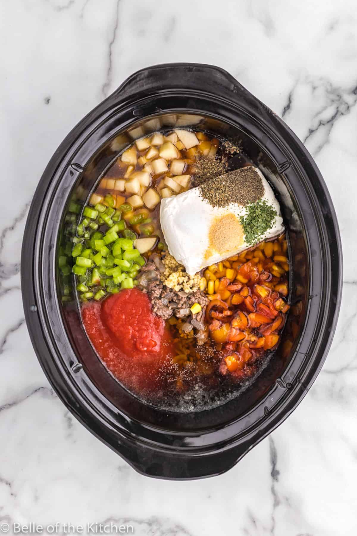 ingredients mixed together in a slow cooker