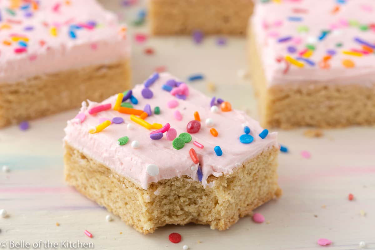 bars with pink frosting and sprinkles