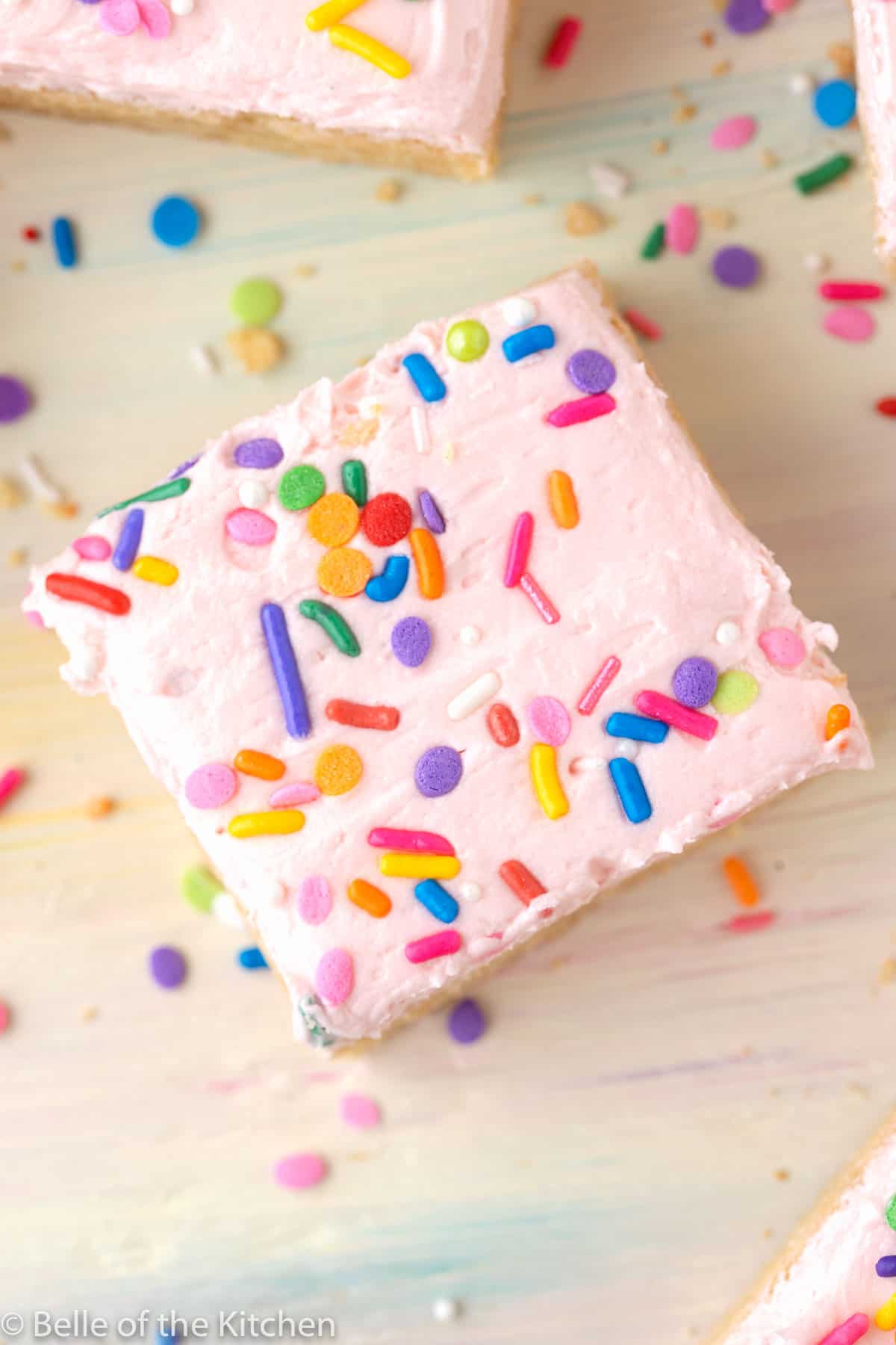 the top of a sugar cookie bar with sprinkles