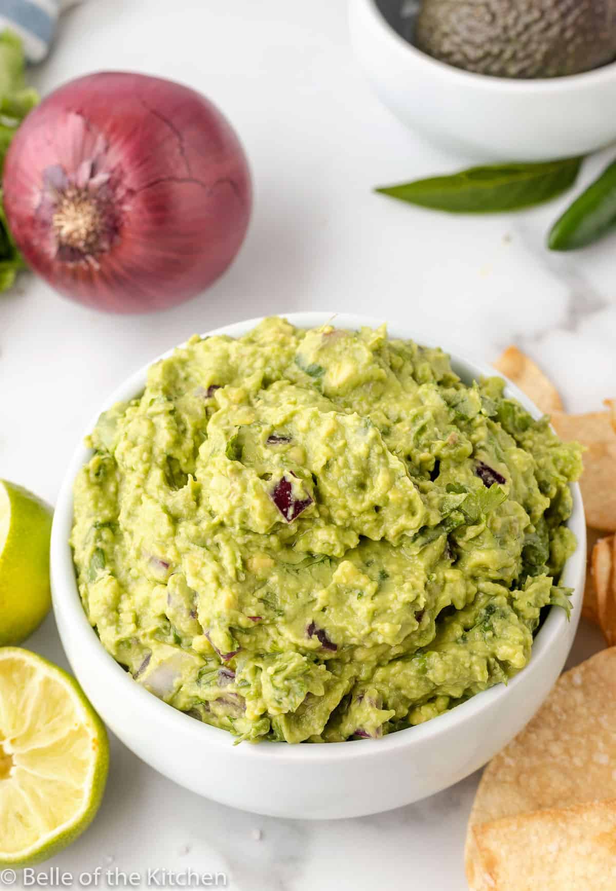 a white bowl of copycat Chipotle guacamole