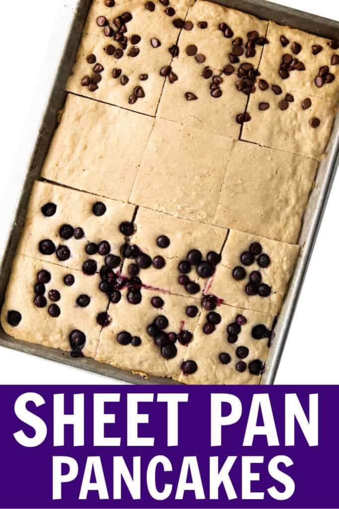 a sheet pan of pancake batter with blueberries and chocolate chips