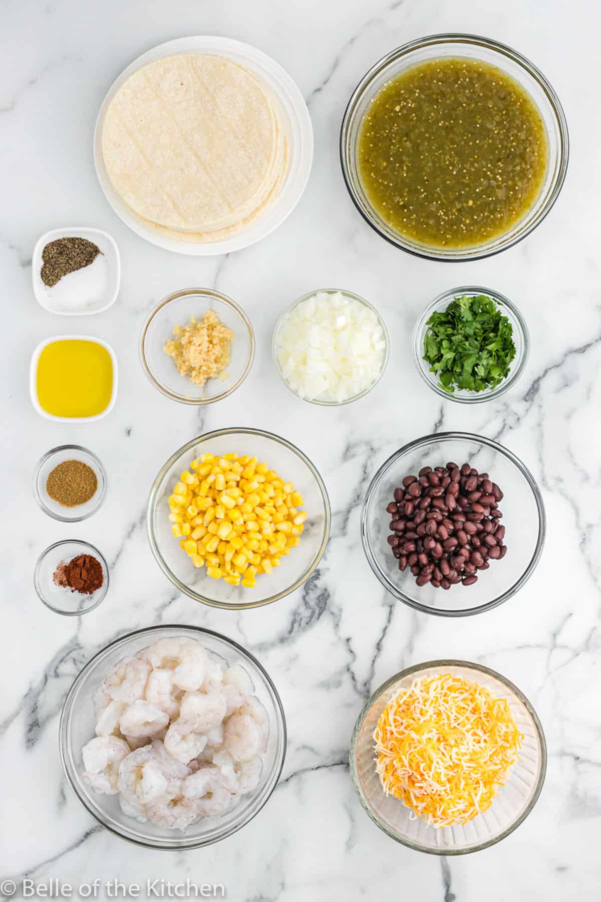 bowls of different ingredients set out on a counter top