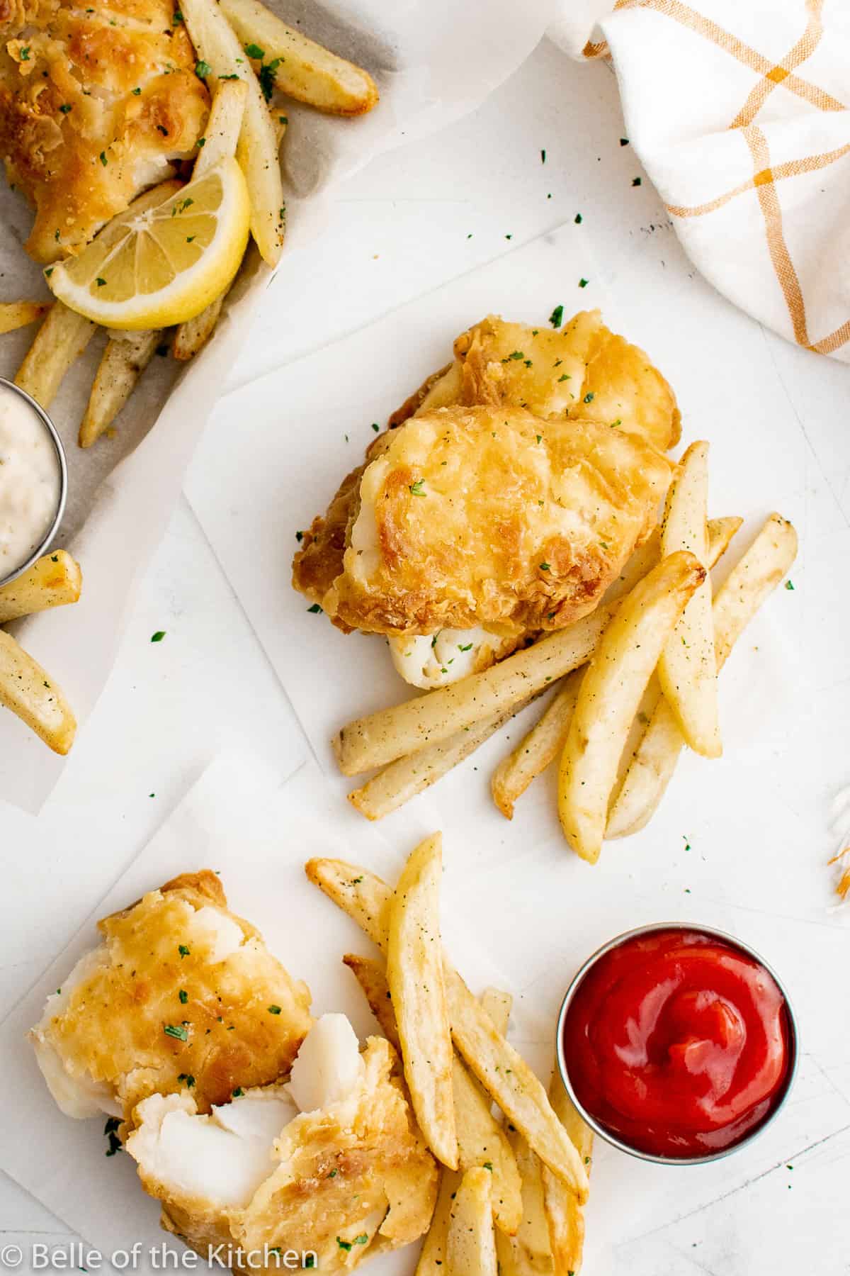 fried fish next to French fries