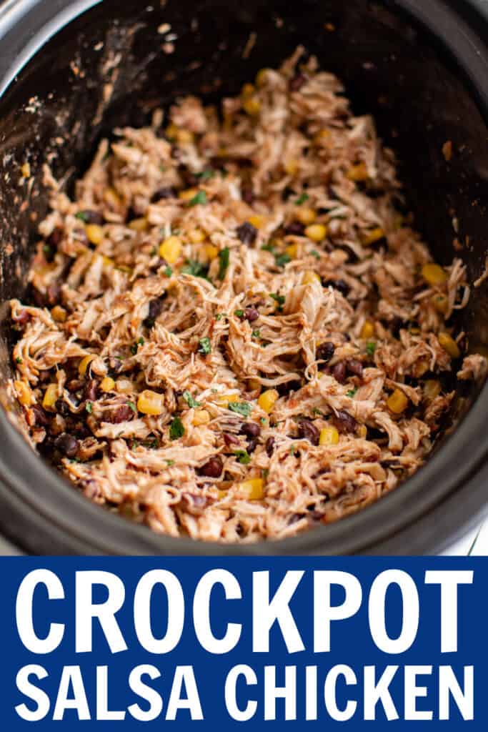 a crockpot full of shredded chicken, corn, salsa, and beans.