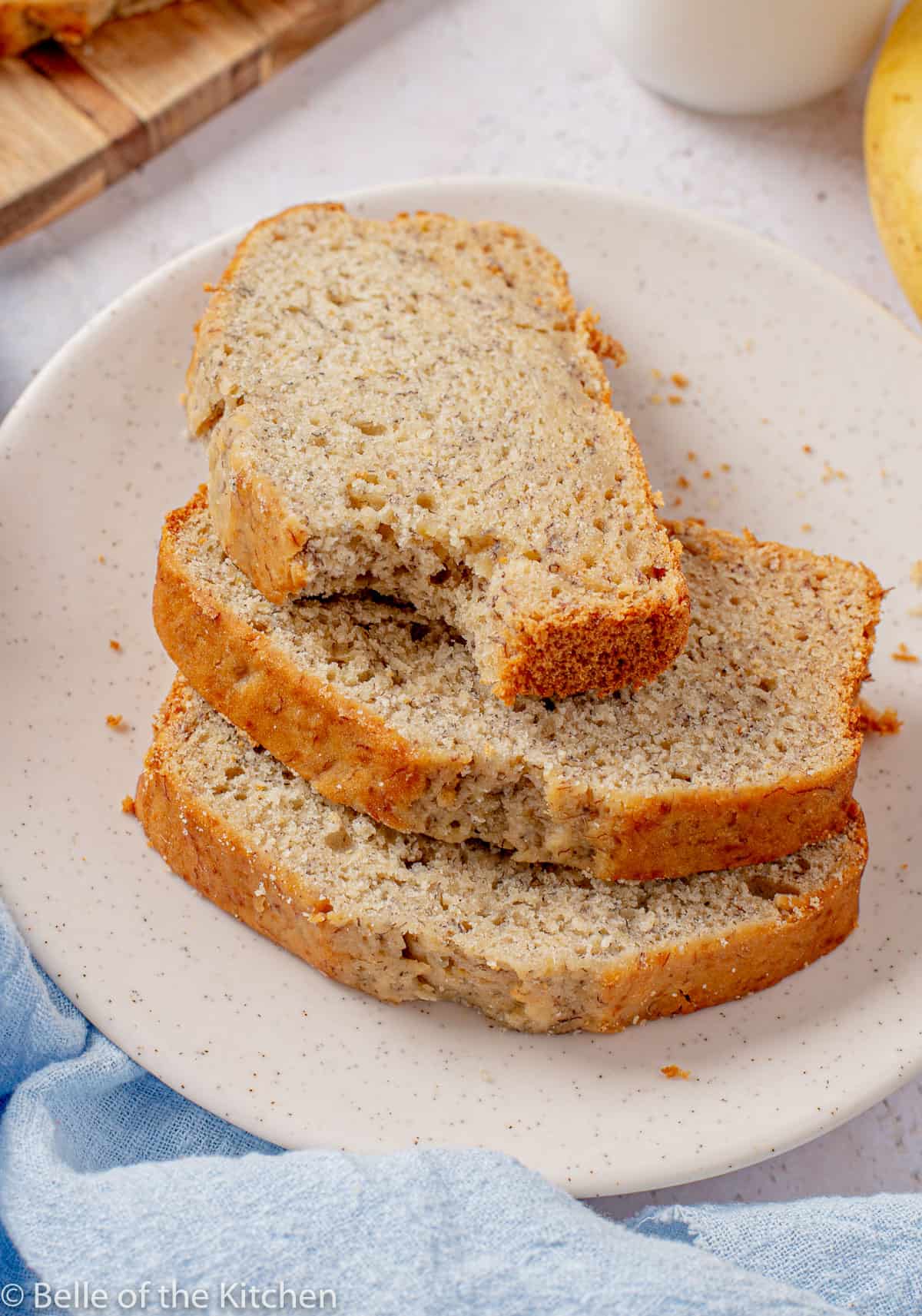 a plate with slices of banana bread
