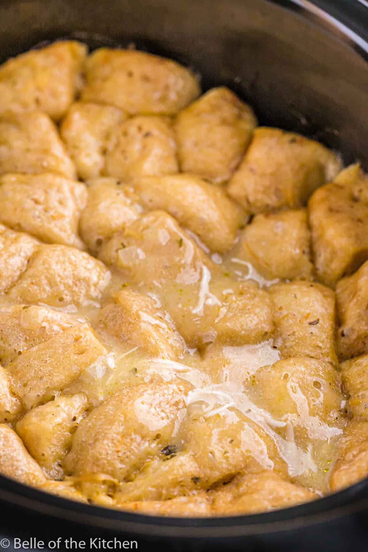 cooked biscuits in a crockpot.