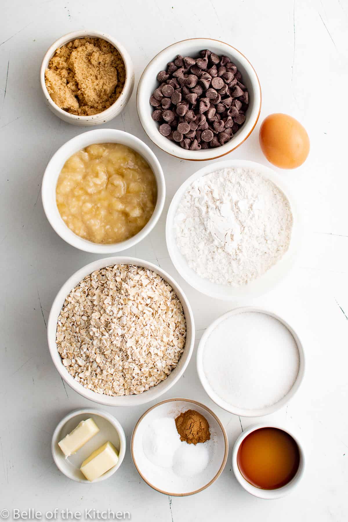 ingredients in bowls on a counter top to make cookies.