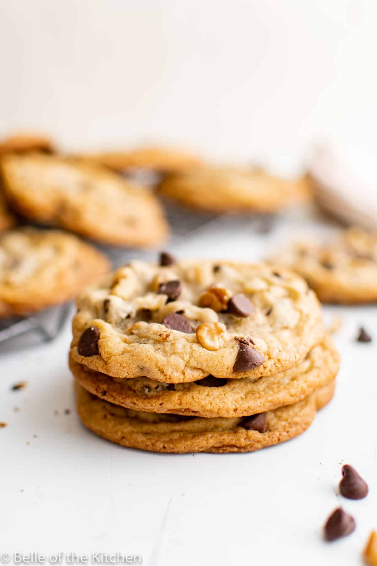 a stack of chocolate chip walnut cookies.