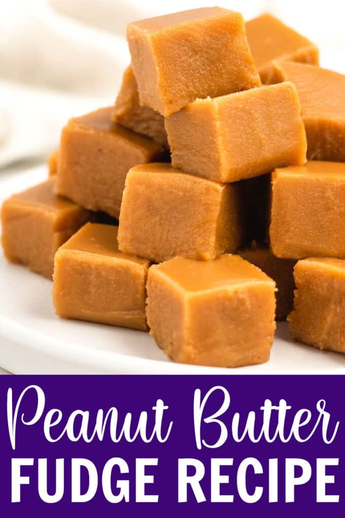a plate stacked with pieces of peanut butter fudge.