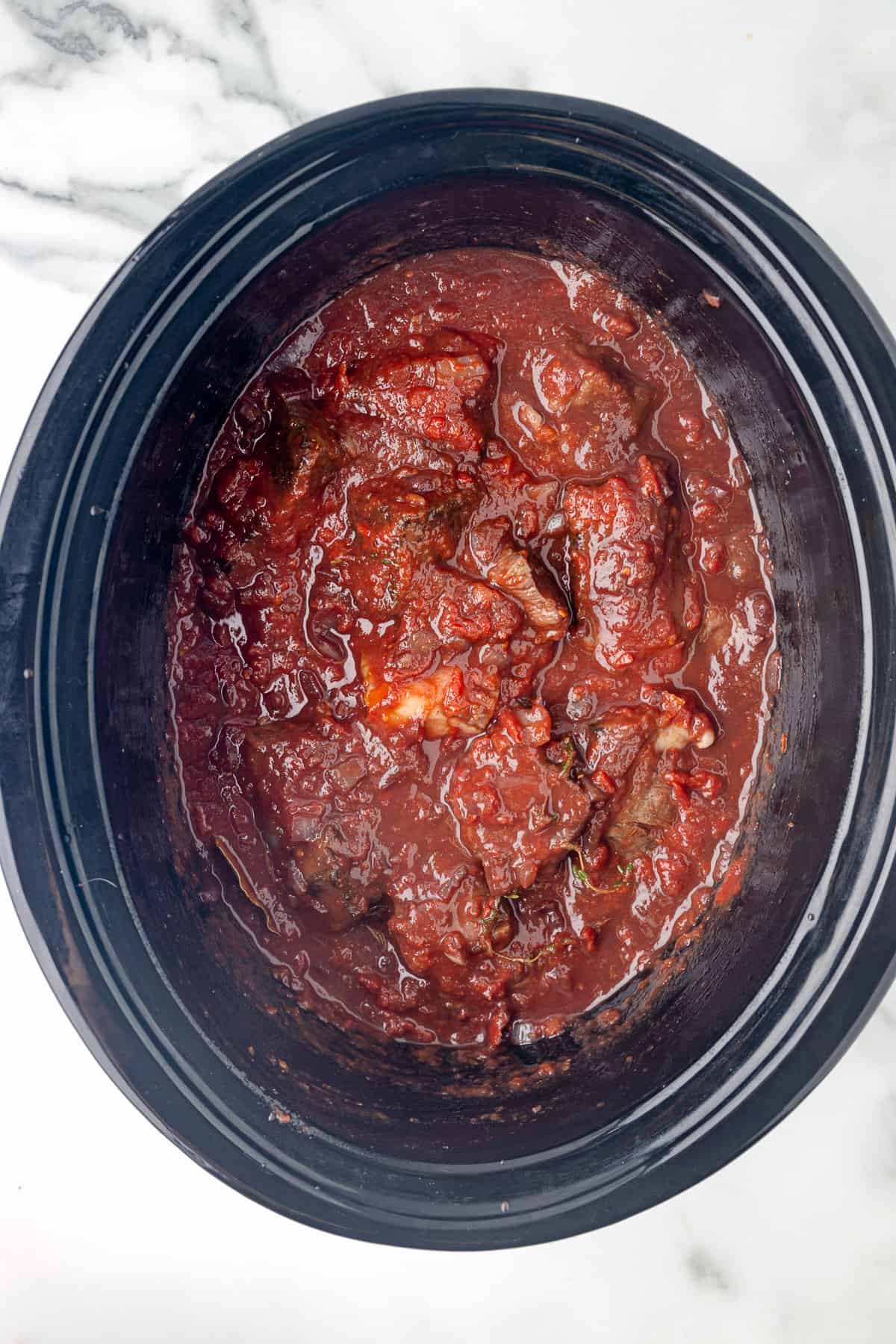 a crockpot full of meat sauce.