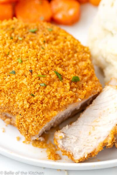 a sliced breaded pork chop.