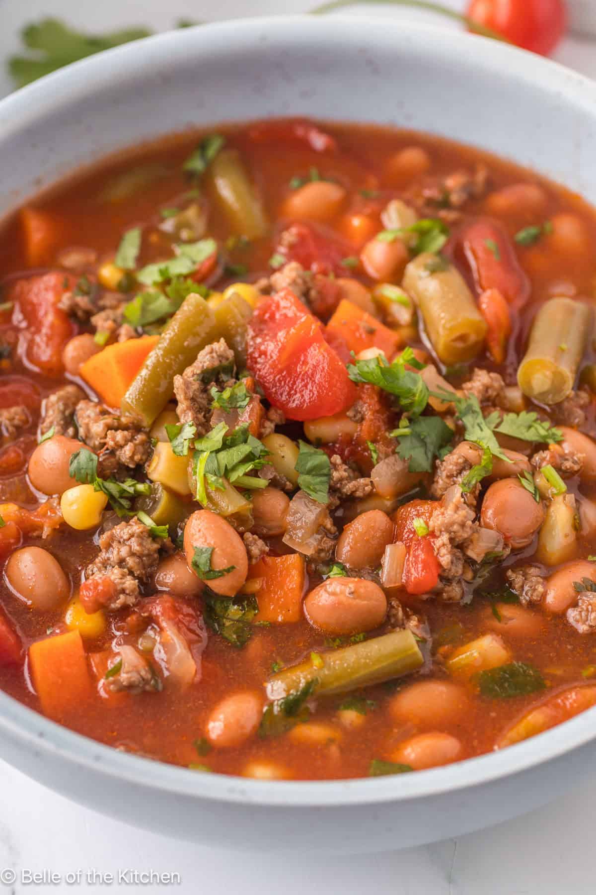 a close up of a bowl of cowboy soup.