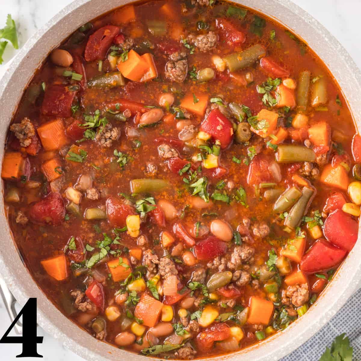a dutch oven full of soup.