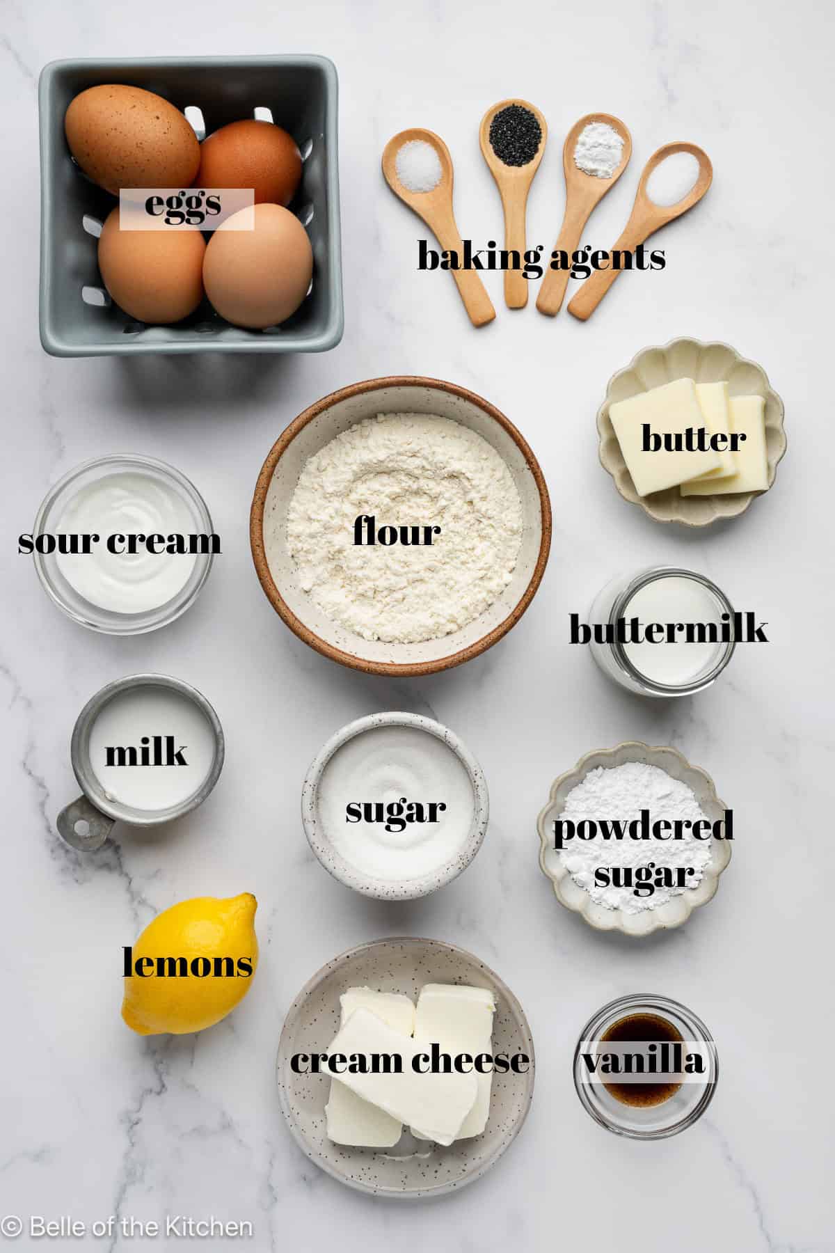 Ingredients in bowls on a marble counter top.