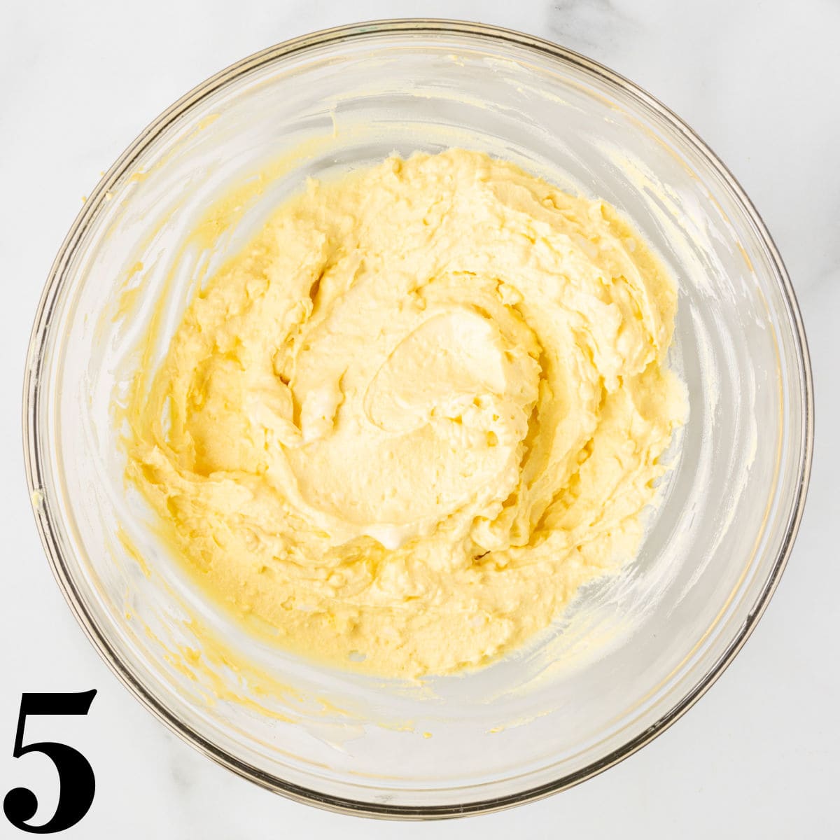 a bowl of creamy deviled egg filling.
