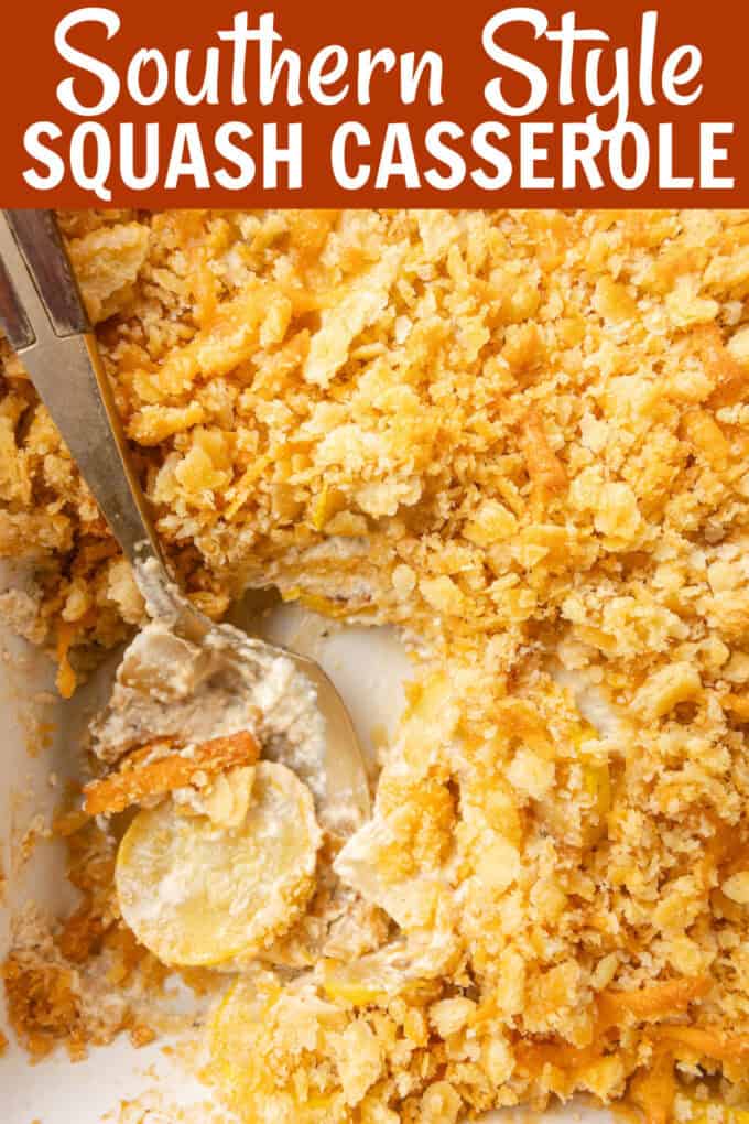 A spoon scooping up squash casserole from a baking dish.