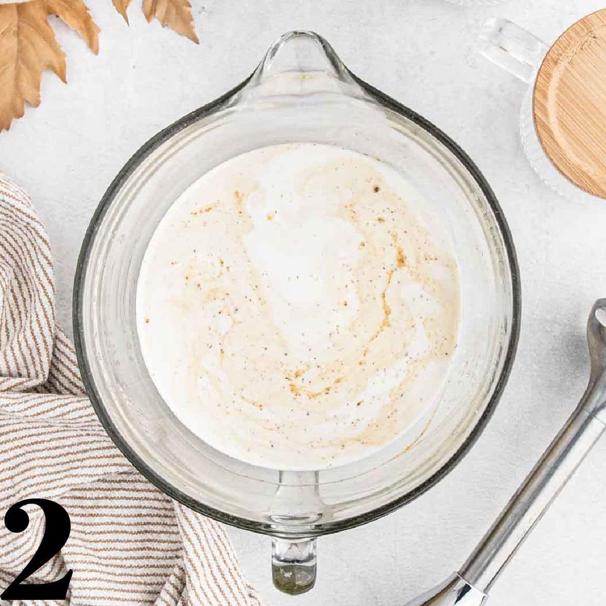 A glass bowl of cream.