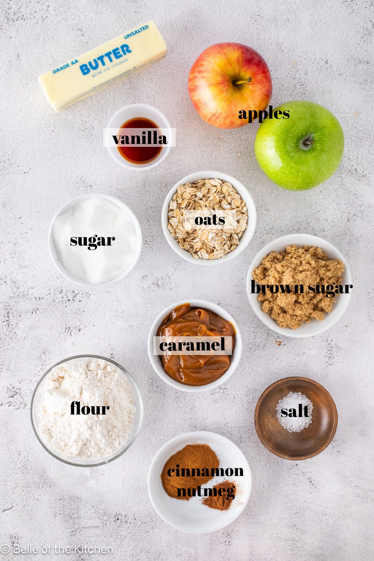 Ingredients in bowls on a white counter top.