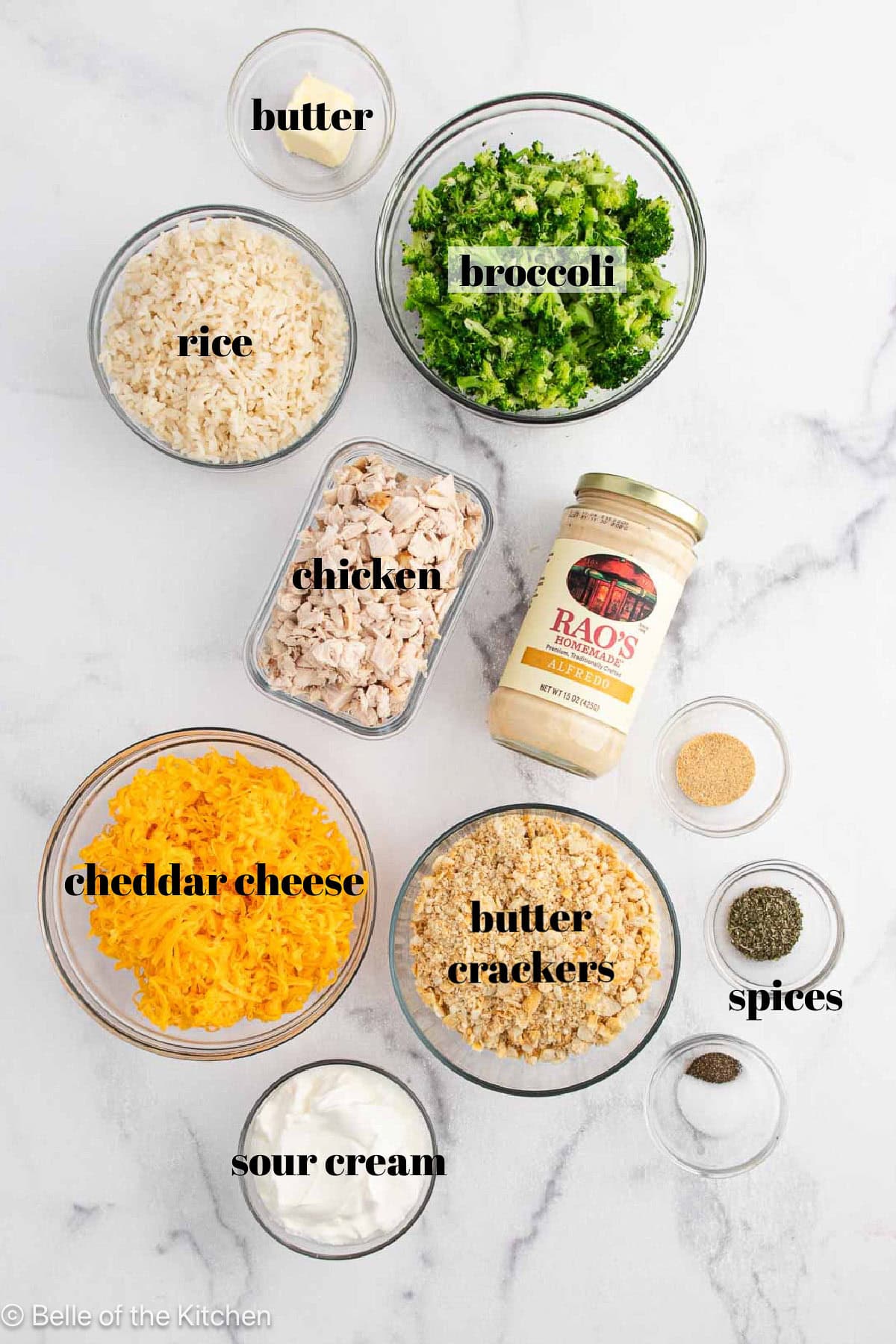 Ingredients in bowls on a marble counter top.